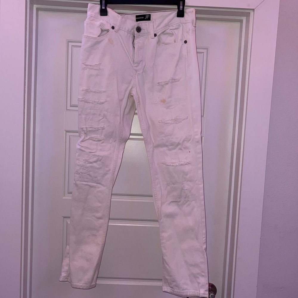 Slim straight ripped white jeans.
